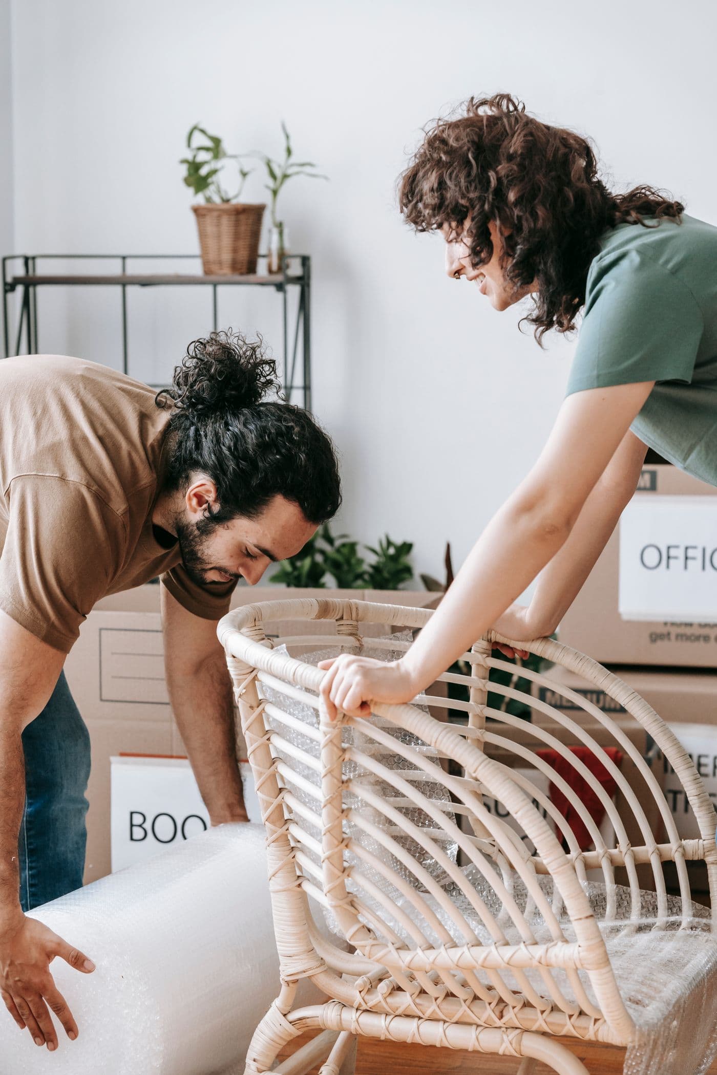 People preparing furniture and boxes for removal